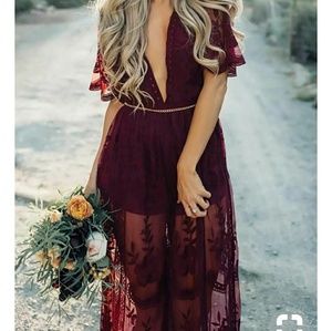 Burgundy lace low cut dress.
